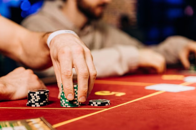 Close-up view of live Ceme Online dealer handling cards and chips at tanggatogel studio